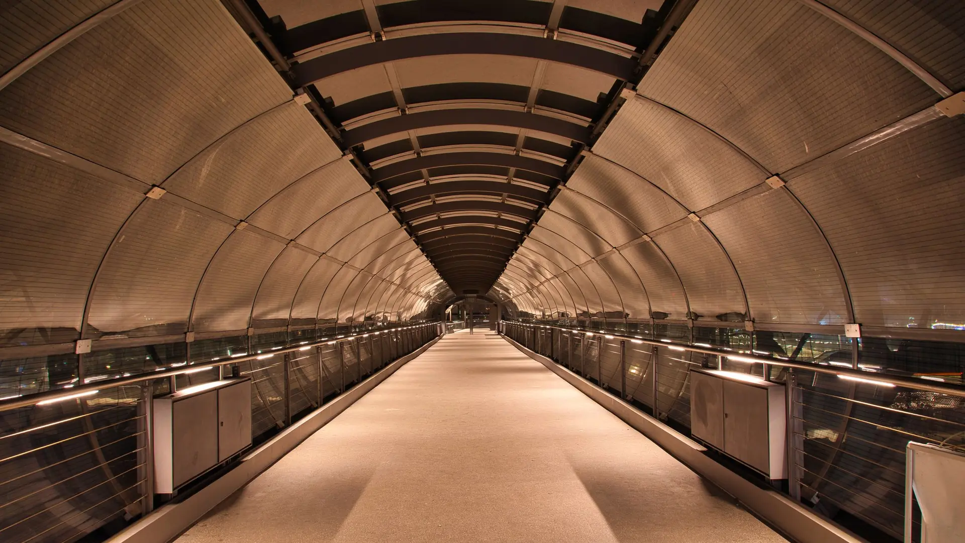 A long symmetrical terminal walkway receding to a single point